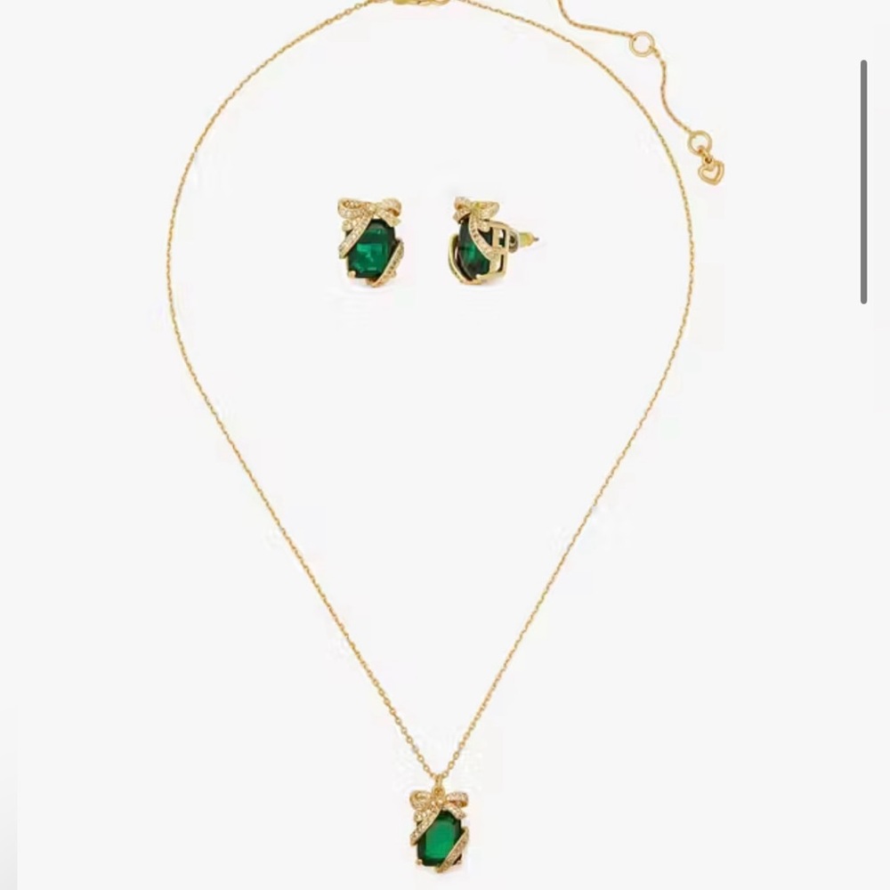 Kate Spade set-pave present bow necklace and earrings.